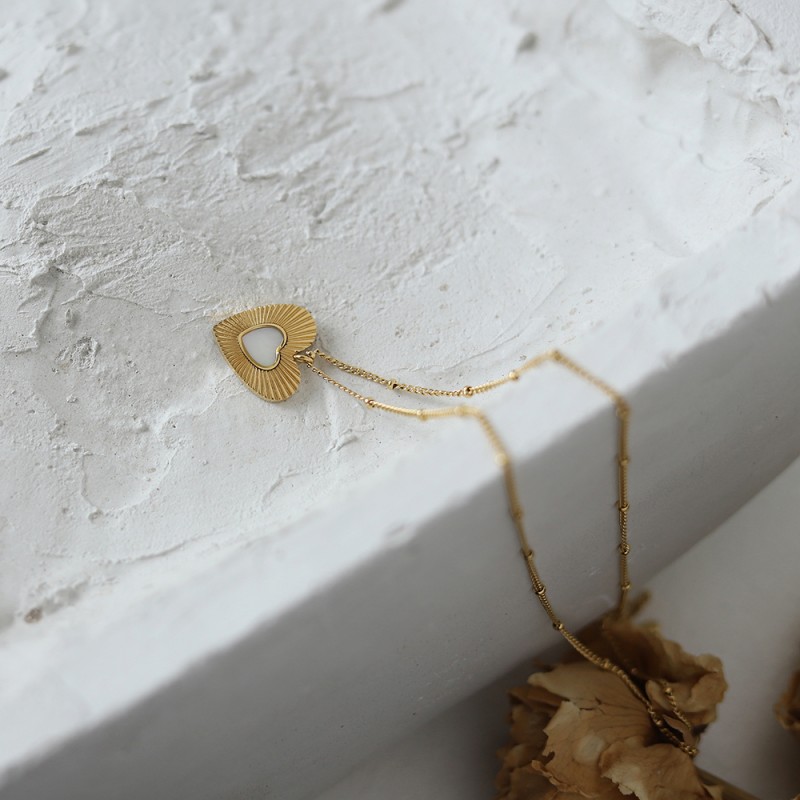 Radiant Heart Carved Shell Sweater Chain 